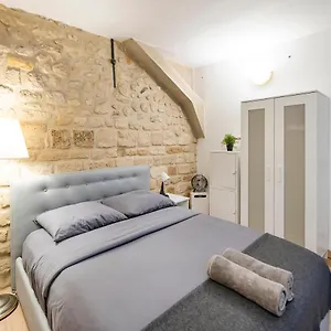 https://akila-apart-city-entre-opera-et-montmarte.fr-paris.fr